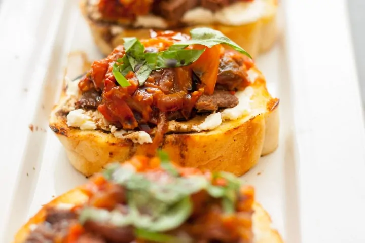 Steak Bruschetta with Goat Cheese and Tomato Jam - www.platingpixels.com