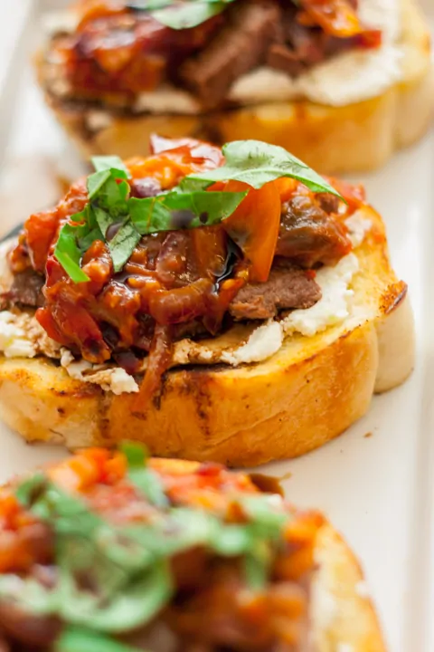 Steak Bruschetta with Goat Cheese and Tomato Jam - www.platingpixels.com