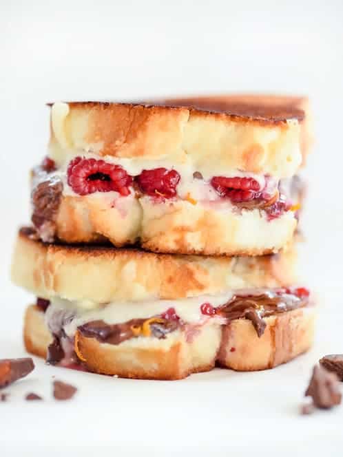 Two Raspberry and Chocolate With Almonds Grilled Cheeses stacked together