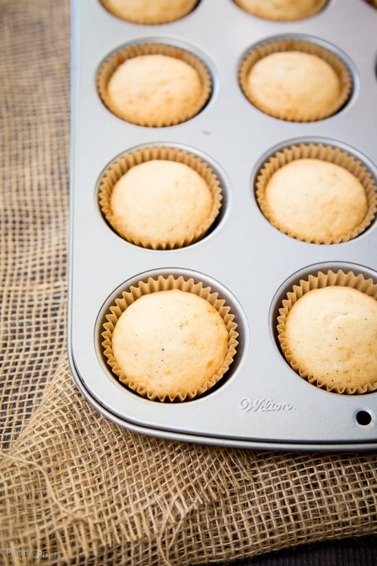 Just baked Spiced Apple Cider Cupcakes in a muffin pan
