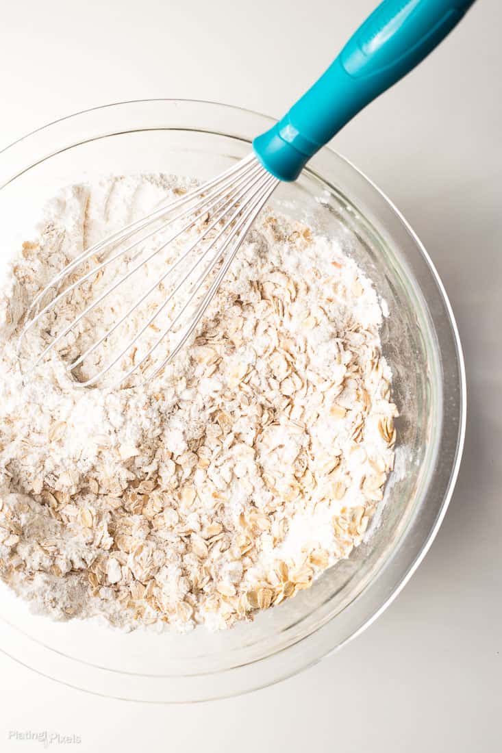 Dry ingredients in a bowl for making Chewy Coconut Chocolate Oatmeal Bars