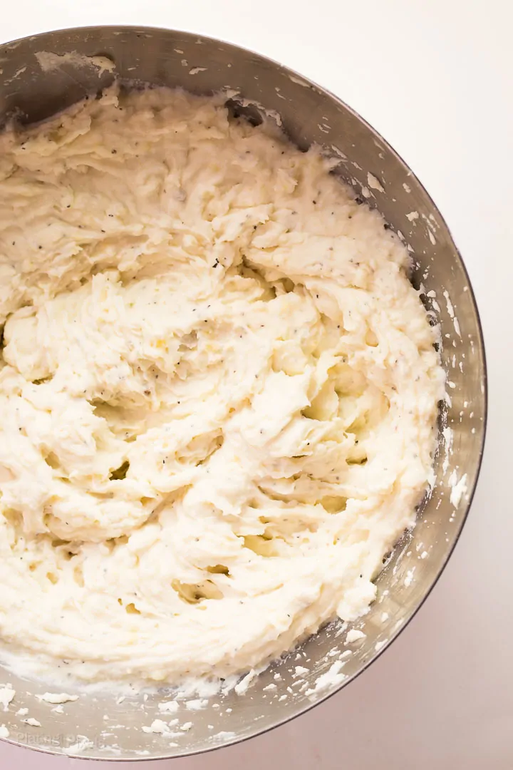Easy Creamy Mashed Potatoes in a large metal bowl