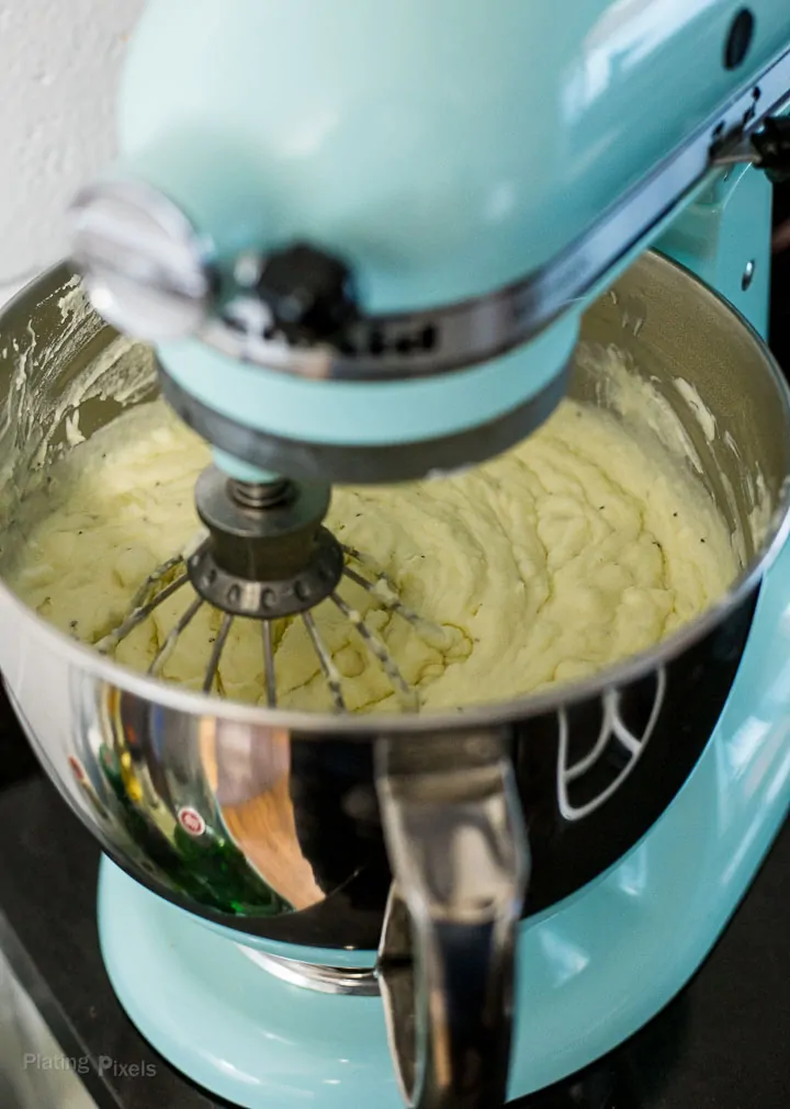 Mixing creamy mashed potatoes in a stand mixer