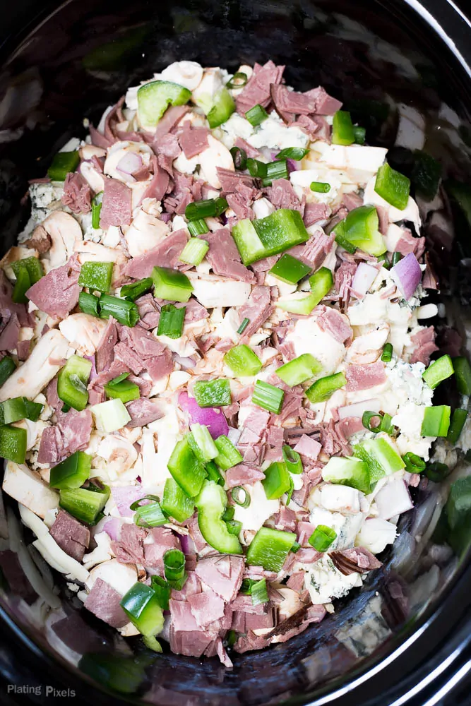 An overhead shot of a Philly Cheese Steak dip in a slow cooker