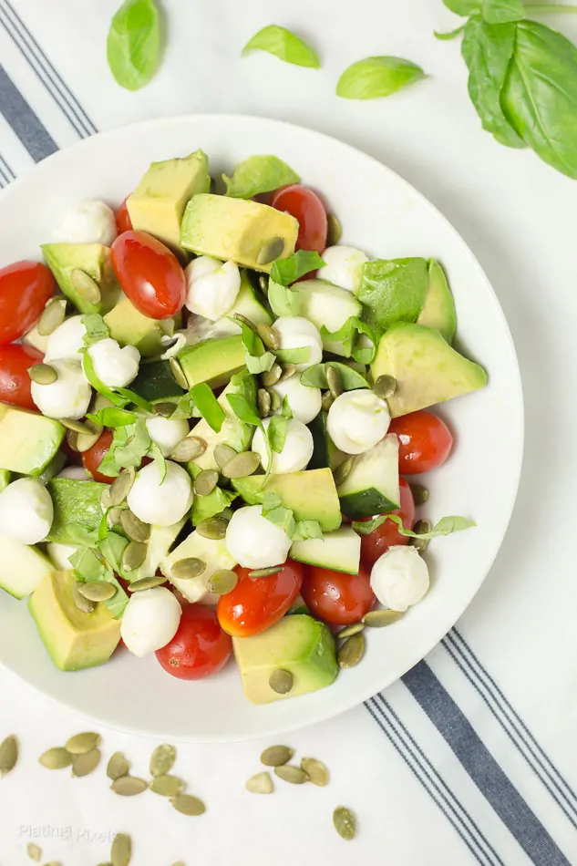 Mozzarella Avocado Caprese Salad recipe - www.platingpixels.com