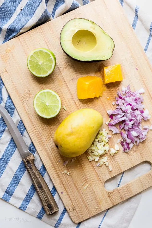 Wild Pollock Fish Burgers with Mango Guacamole recipe - www.platingpixels.com