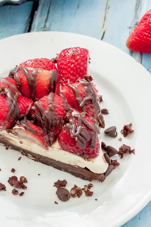 Slice of Strawberry Nutella No Bake Cheesecake on plate