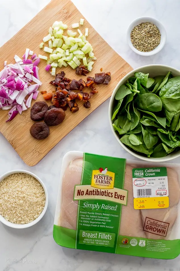 An overhead shot of ingredients for making Apricot and Spinach Stuffed Chicken Breasts