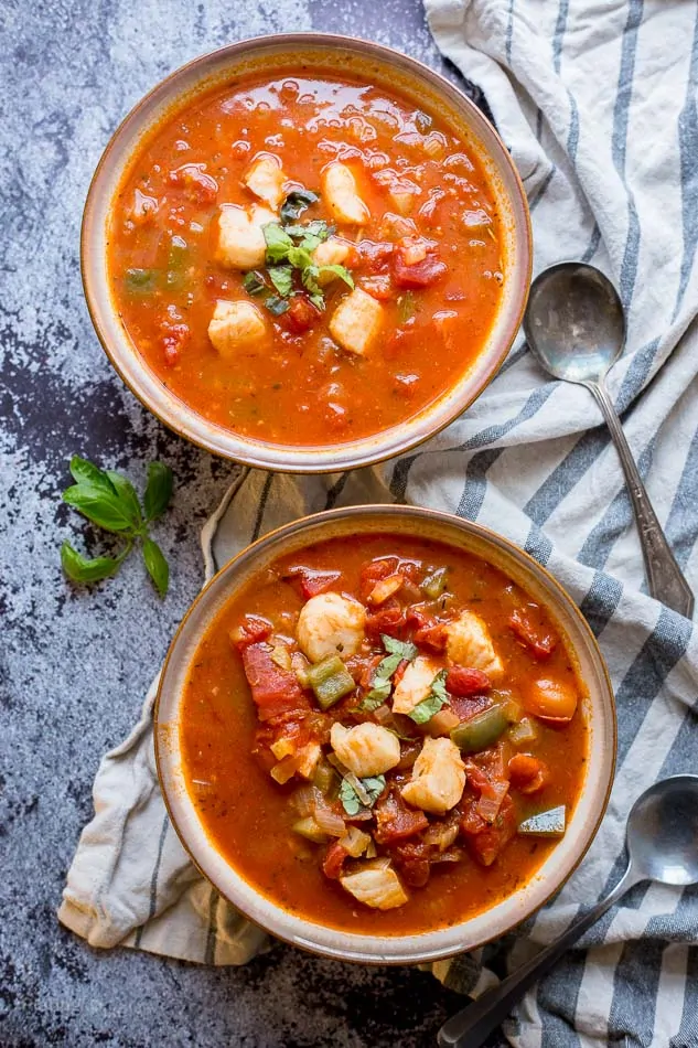 An overhead shot of two bowls of Italian Cod Fish Soup