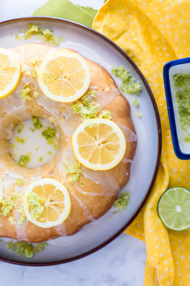 Prepared Lemon Bundt Cake on a cake platter topped with lemon slices