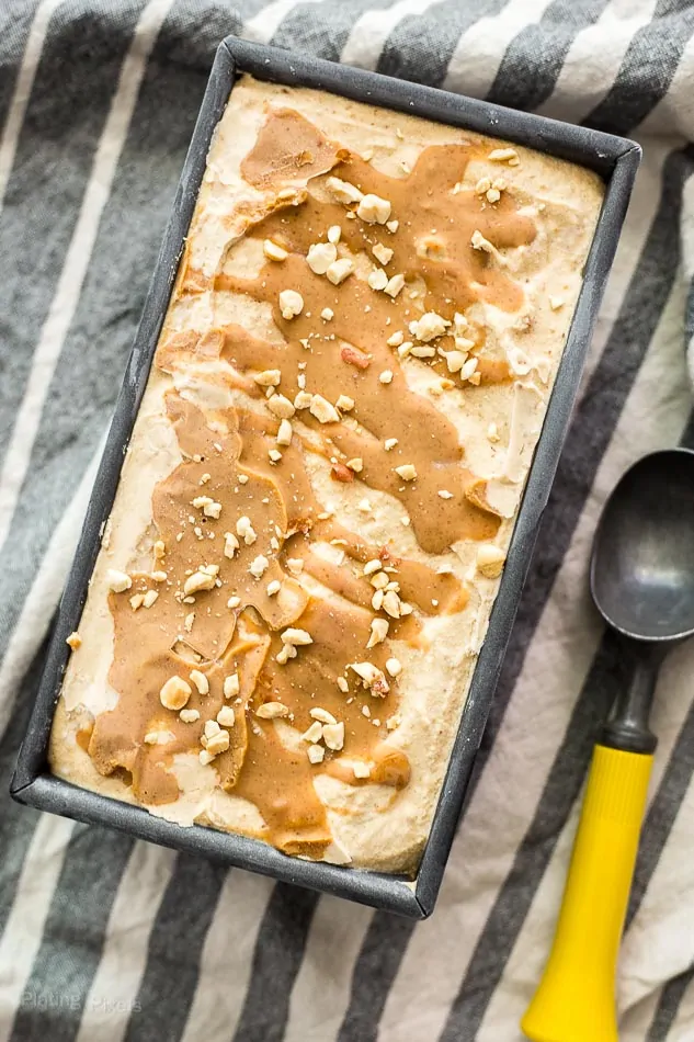 Overhead shot of No Churn Peanut Butter Ice Cream frozen in a metal tin pan