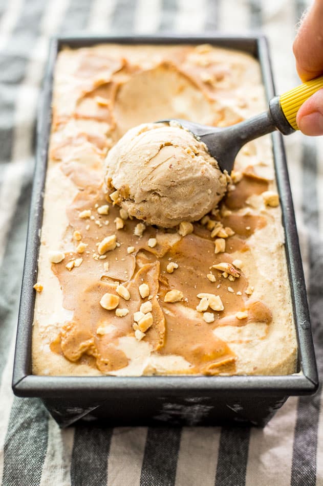 Scooping homemade Peanut Butter Ice Cream with an ice cream scooper