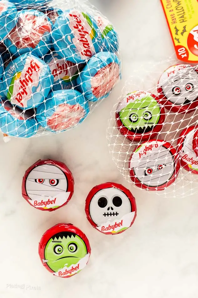 Two packages of Babybel Halloween themed mini cheese wheels