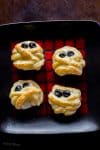 Halloween Puff Pastry Mummy Cheese Wheels recipe | platingpixels.com
