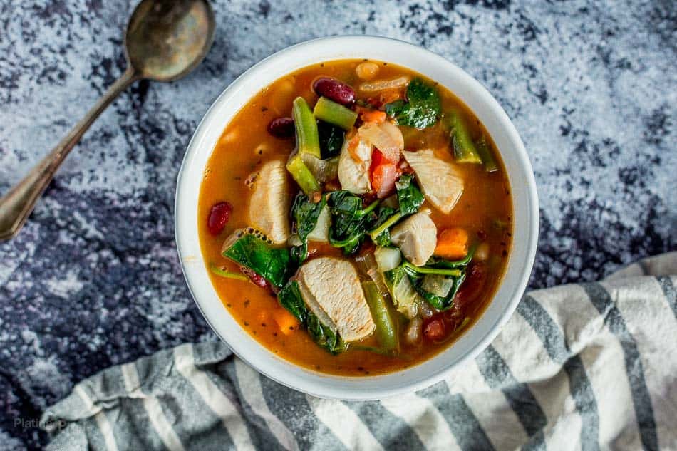Chicken Minestrone Soup in a white bowl