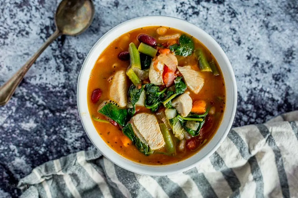 Chicken Minestrone Soup in a white bowl