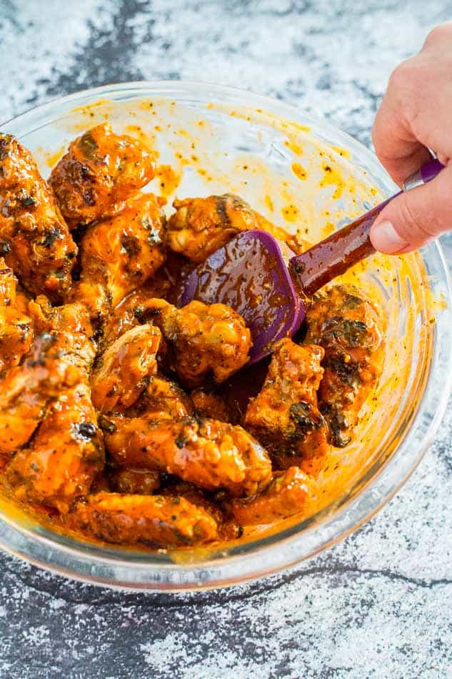 Mixing Easy Saucy Grilled Buffalo Wings recipe - platingpixels.com