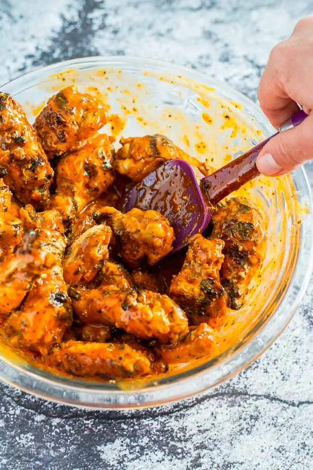 Mixing Easy Saucy Grilled Buffalo Wings recipe - platingpixels.com