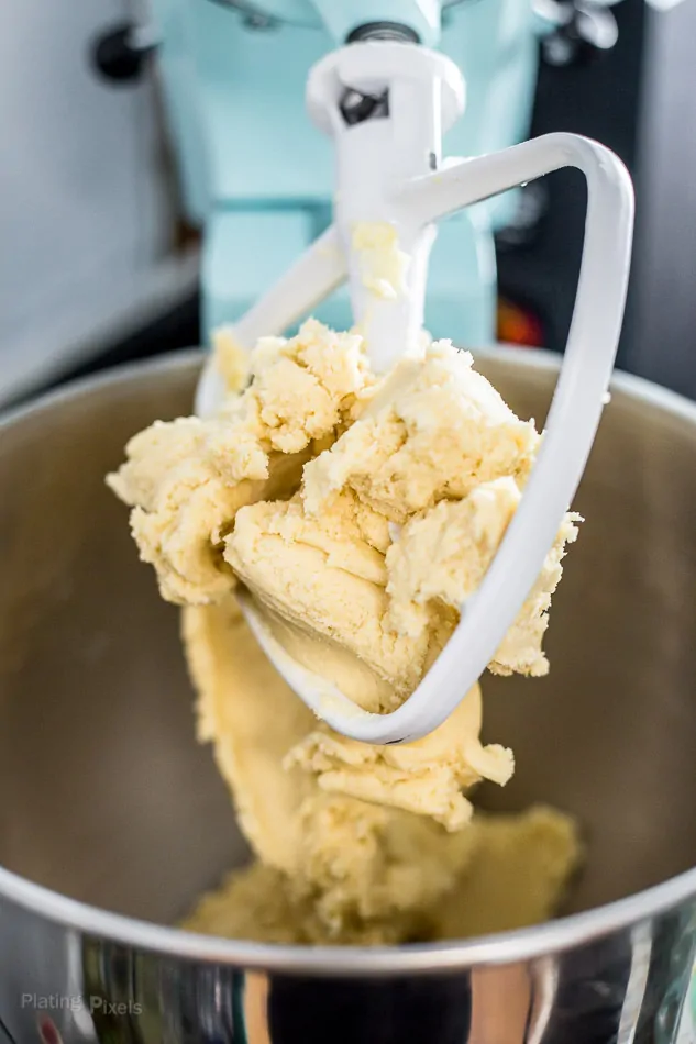 Sugar cookie batter hangin on a kitchenaid paddle mixer