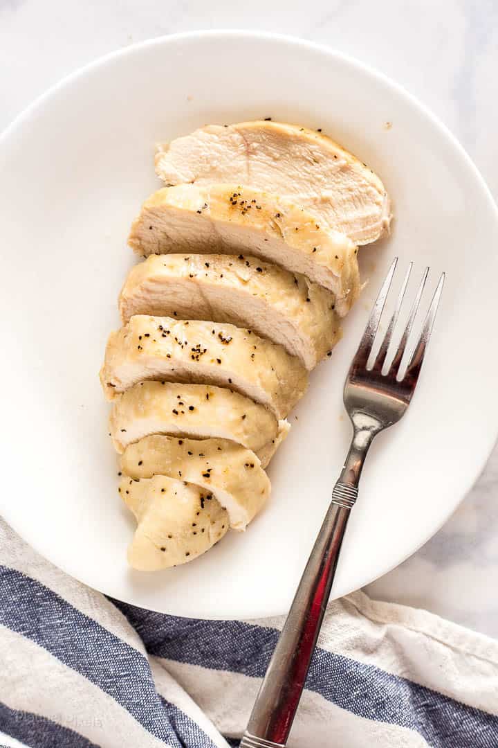 Sliced Baked Boneless Skinless Chicken Breast on a plate