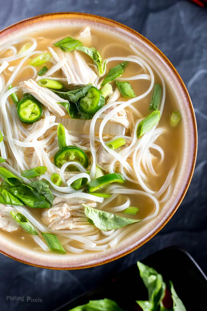 Close-up of bowl of Slow Cooker Chicken Pho Soup recipe