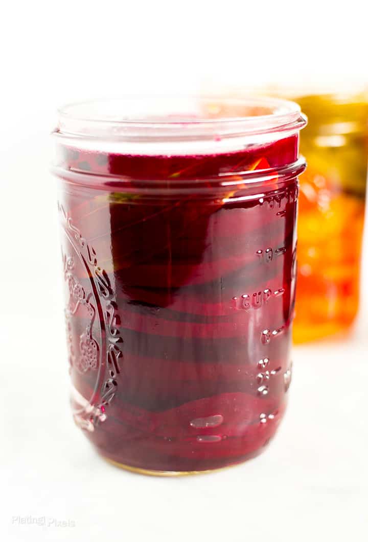 Side angle photo of a jar of Refrigerator Pickled Beets