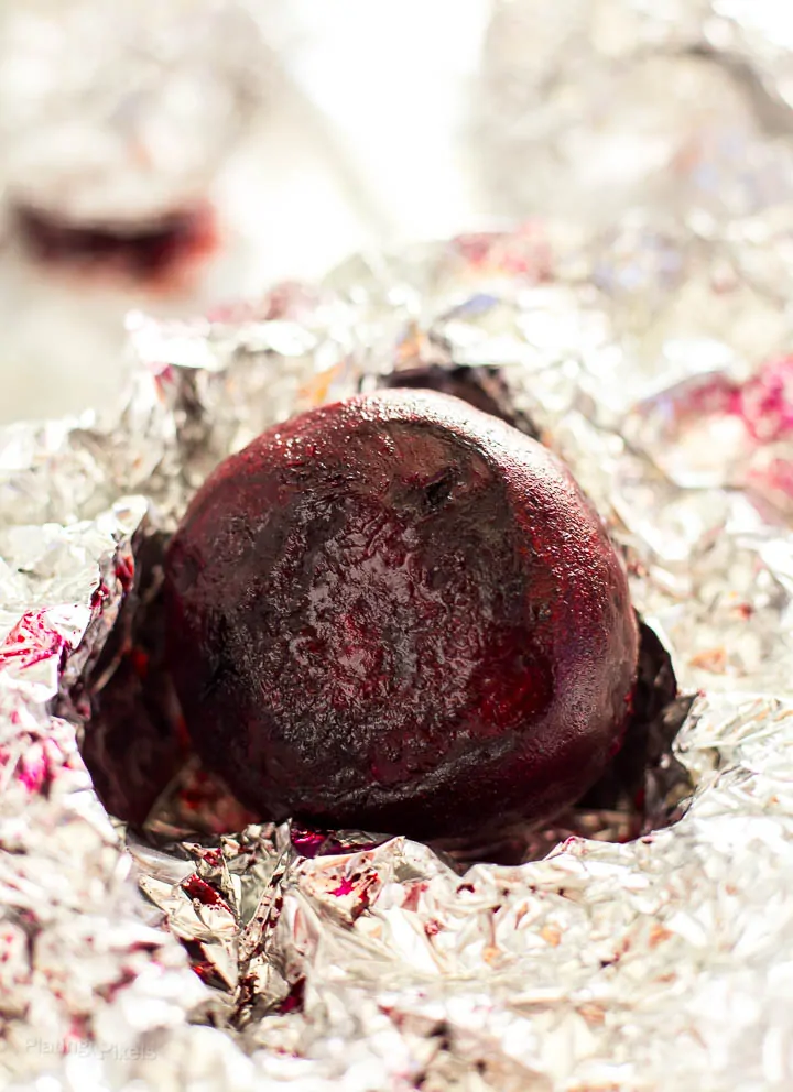 Just roasted beet partially unwrapped from foil