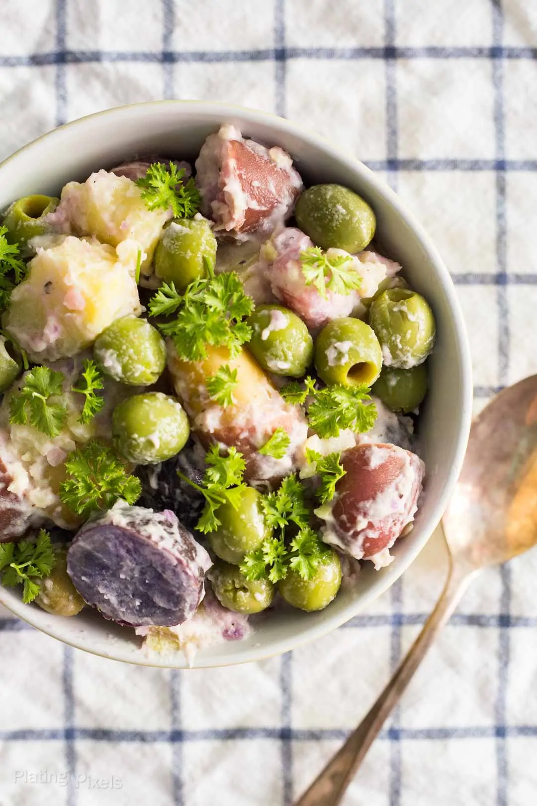 Fingerling Potato Salad with Green Olives prepared in a bowl