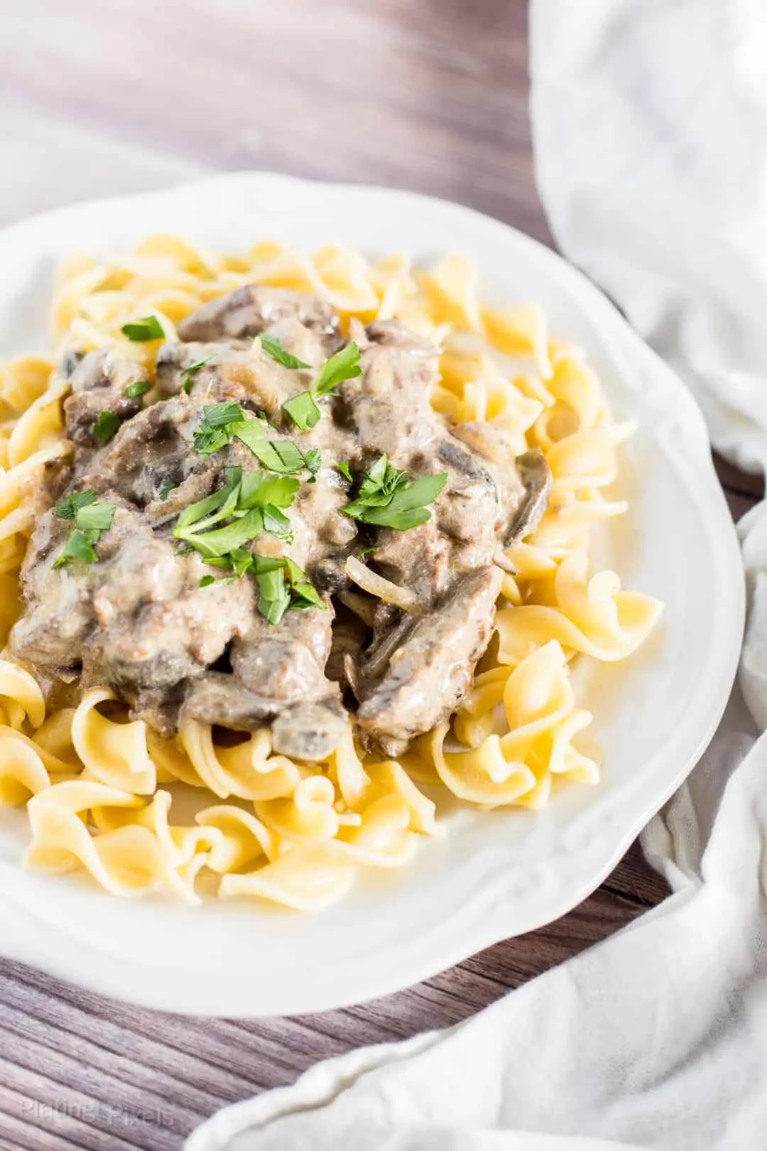 Close up shot of Slow Cooker Beef Stroganoff on a plate ready to serve