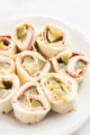 Close up of Salmi Pinwheels on a white plate