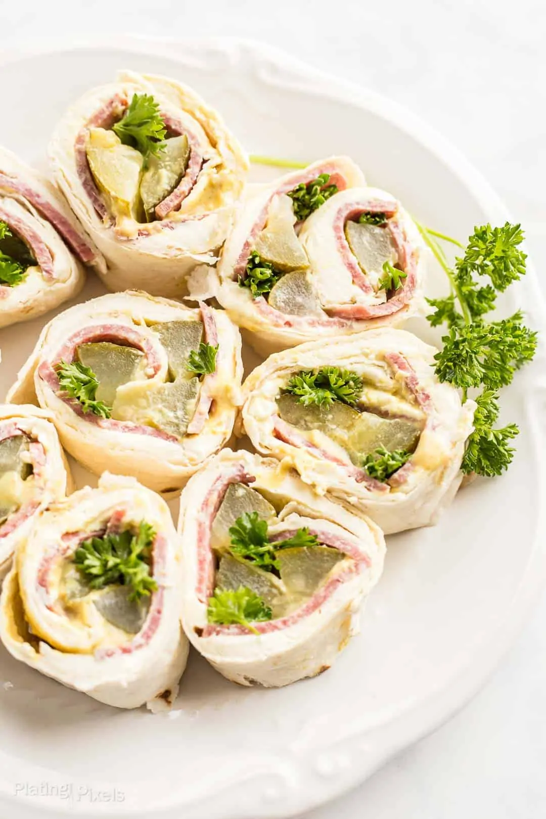 Salmi Pinwheel slices garnished with parsley