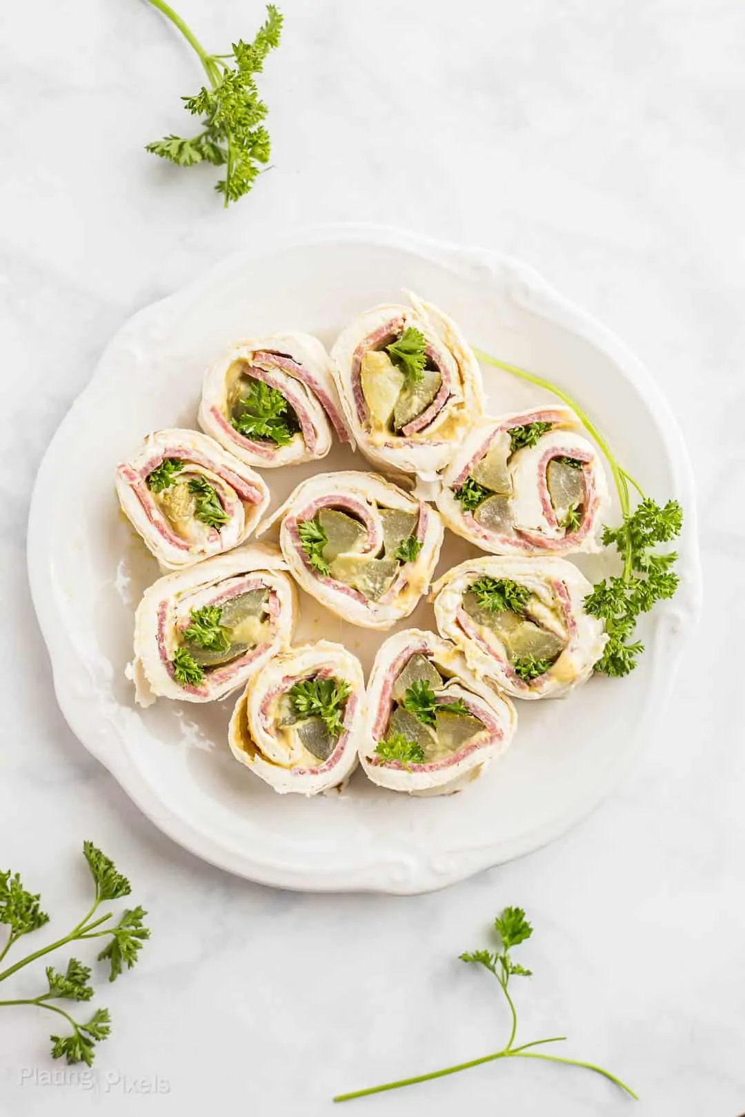 Overhead shot of Salmi Pinwheels on marble table