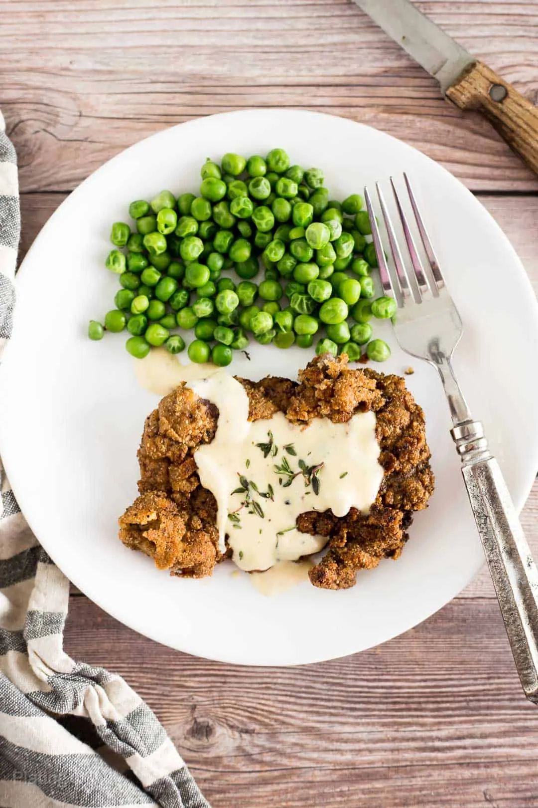 Overhead shot of Keto Chicken Fried Steak ready on a plate to eat