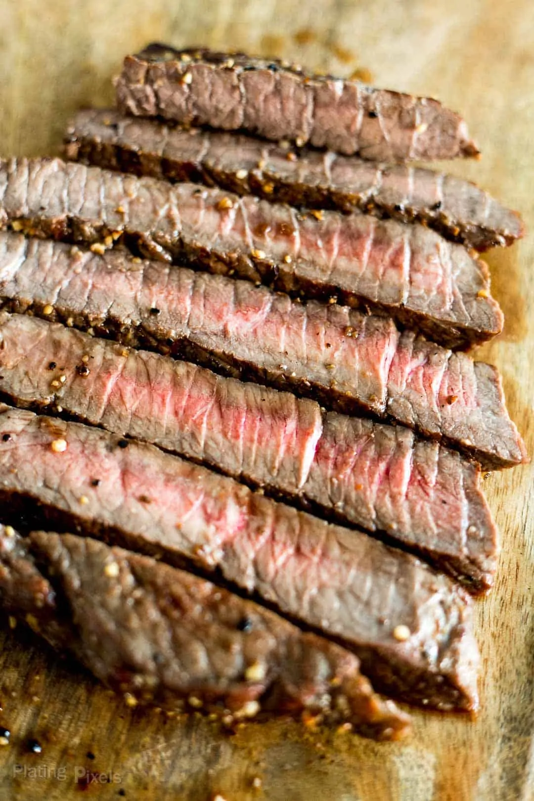Sliced London Broil on a cutting board