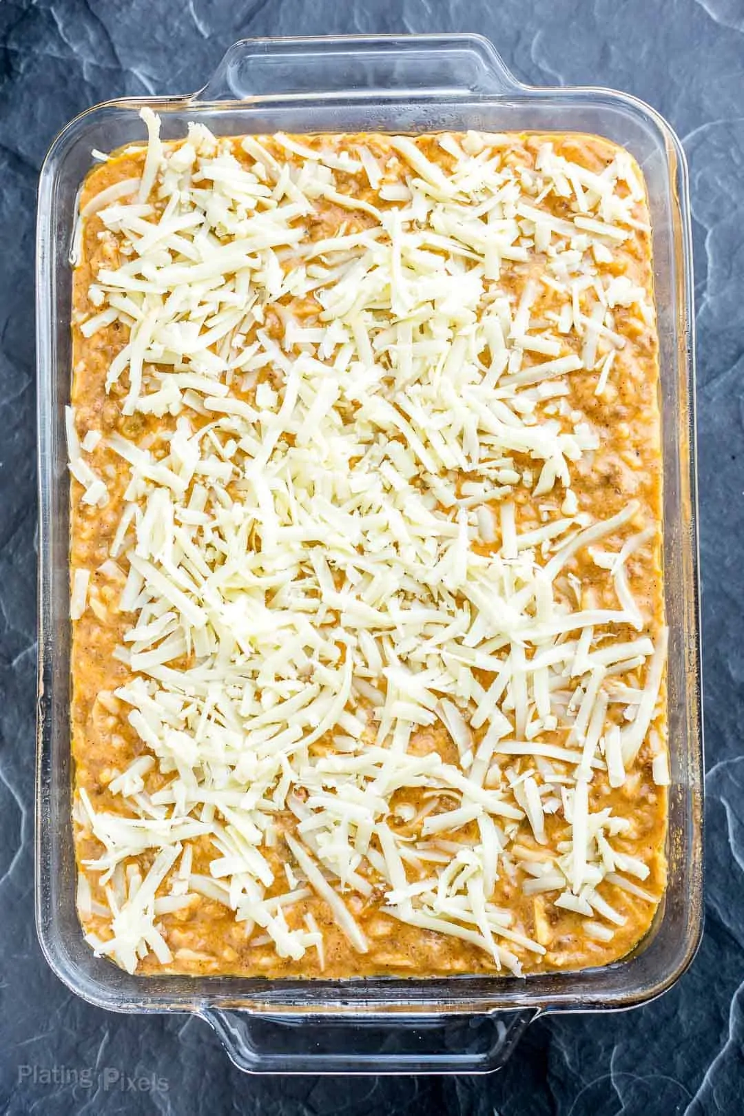 Chorizo Hash Brown Breakfast Casserole in a baking dish before it's cooked