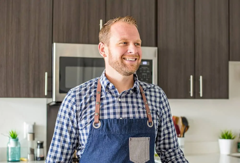 Matt Ivan of Plating Pixels smiling in the kitchen