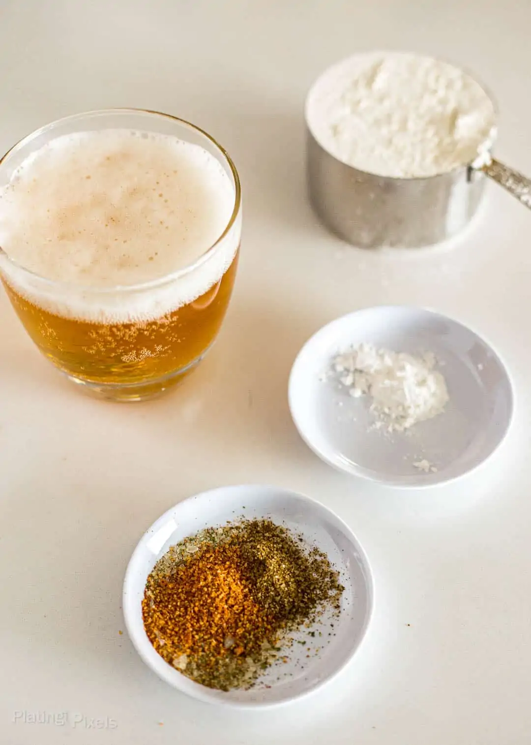 Ingredients to make beer batter on a counter