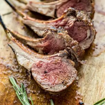 Grilled lamb chops on a cutting board
