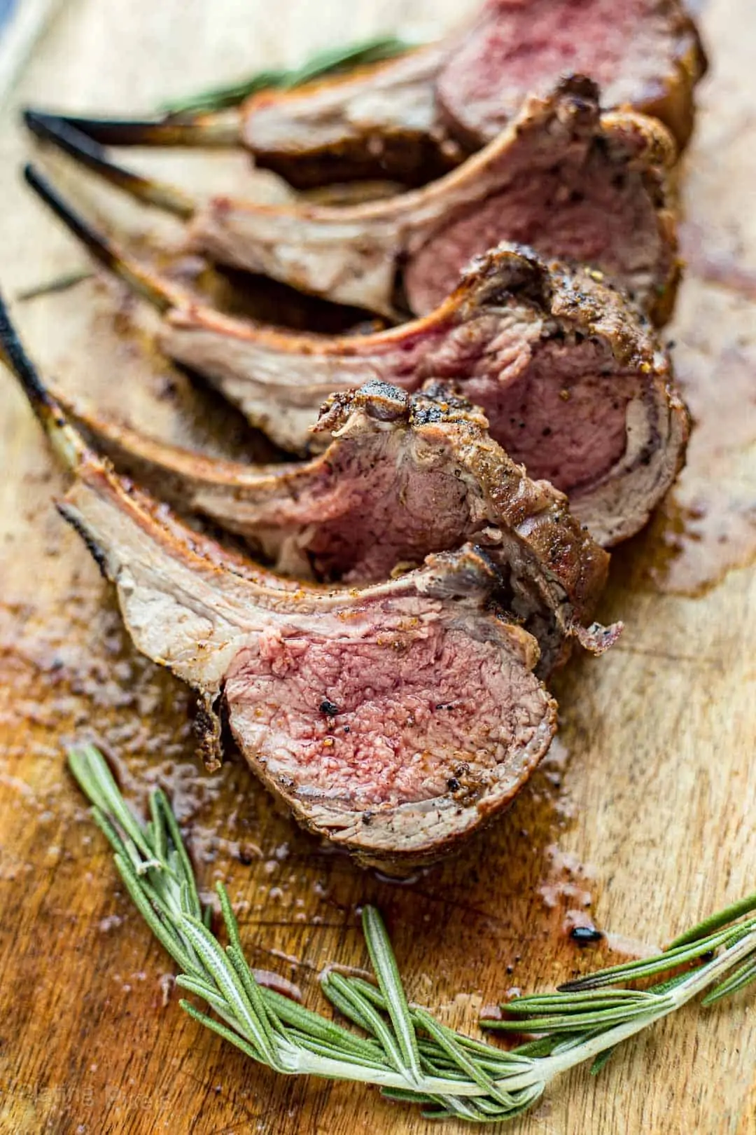 Grilled lamb chops on a cutting board