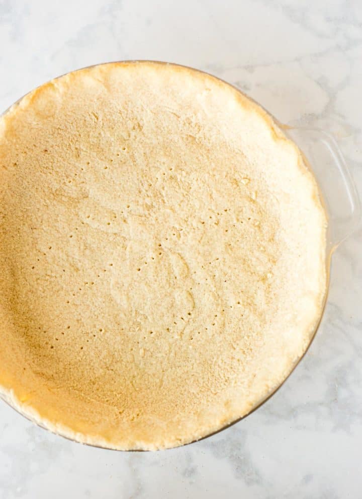 Just baked Keto Pie Crust in a pie pan