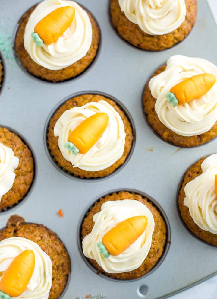 Decorated Carrot Cake Cupcakes in a cupcake pan