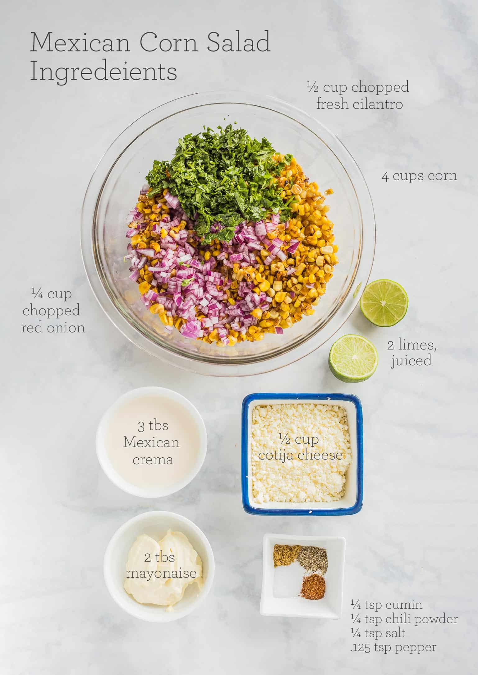 Ingredients prepared to make Mexican Street Corn Salad with text overlay showing amounts