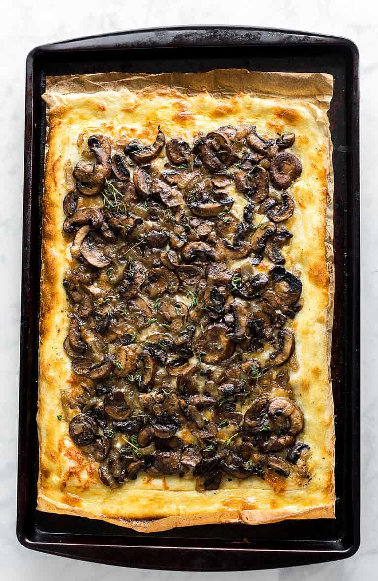 Overhead shot of a Mushroom Tart on a baking sheet