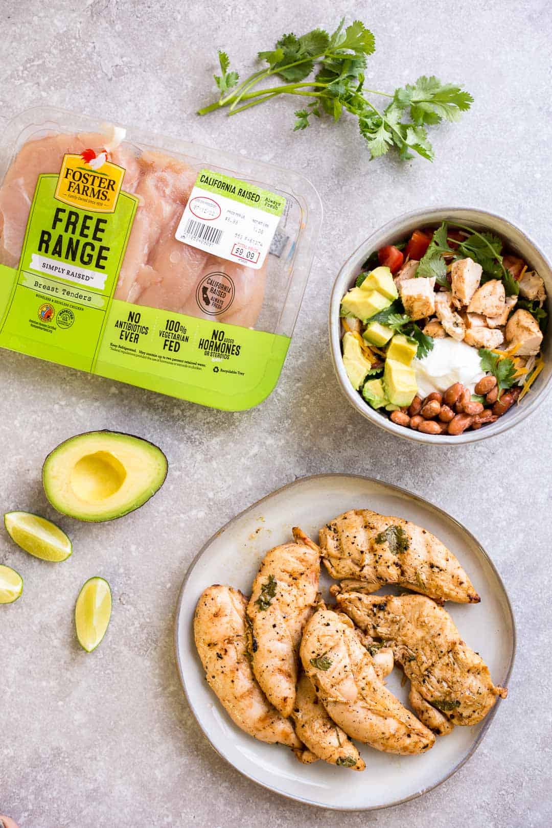 Grilled Chili Lime Chicken breasts next to a package of Foster Farms chicken breasts