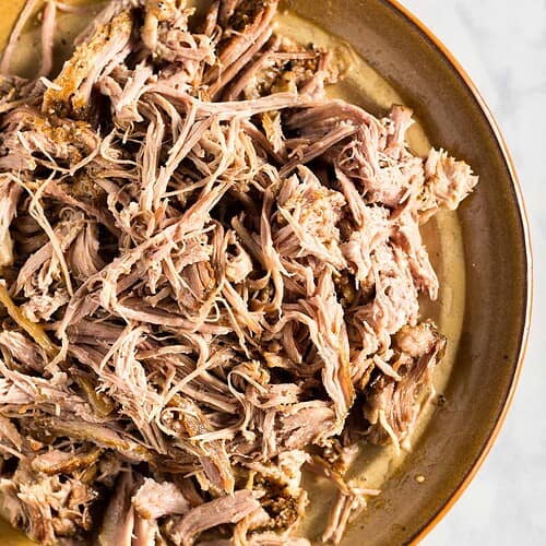 Plate of shredded slow cooker carnitas