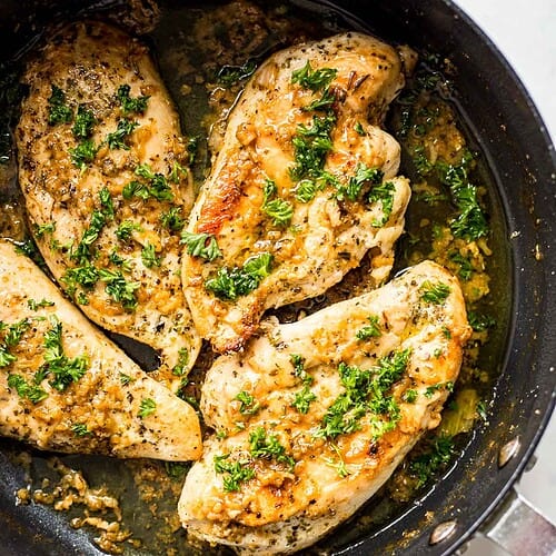 Garlic Butter Chicken cooking in a pan