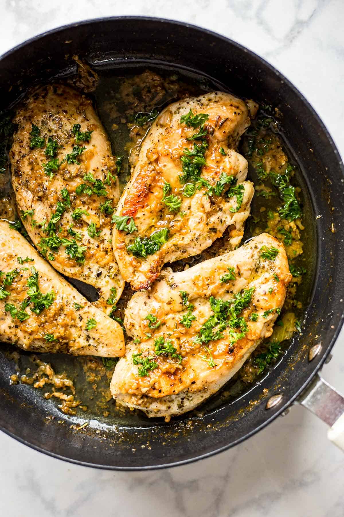 Garlic Butter Chicken cooking in a pan